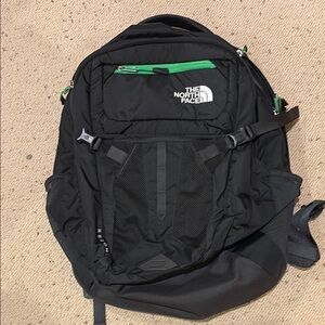 The North Face Black and Green Backpack with Padded Straps